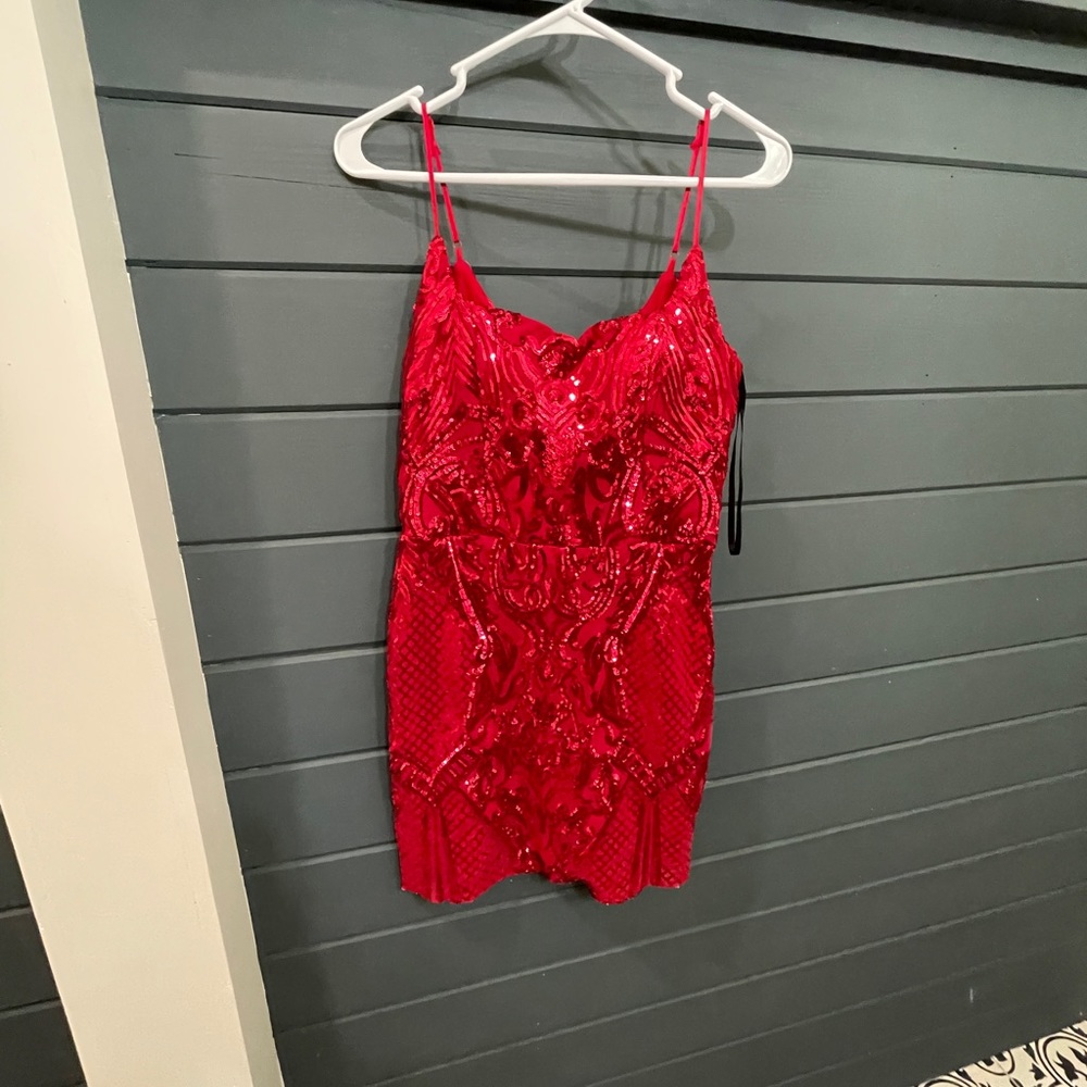 red sequin hoco dress with built in padding.